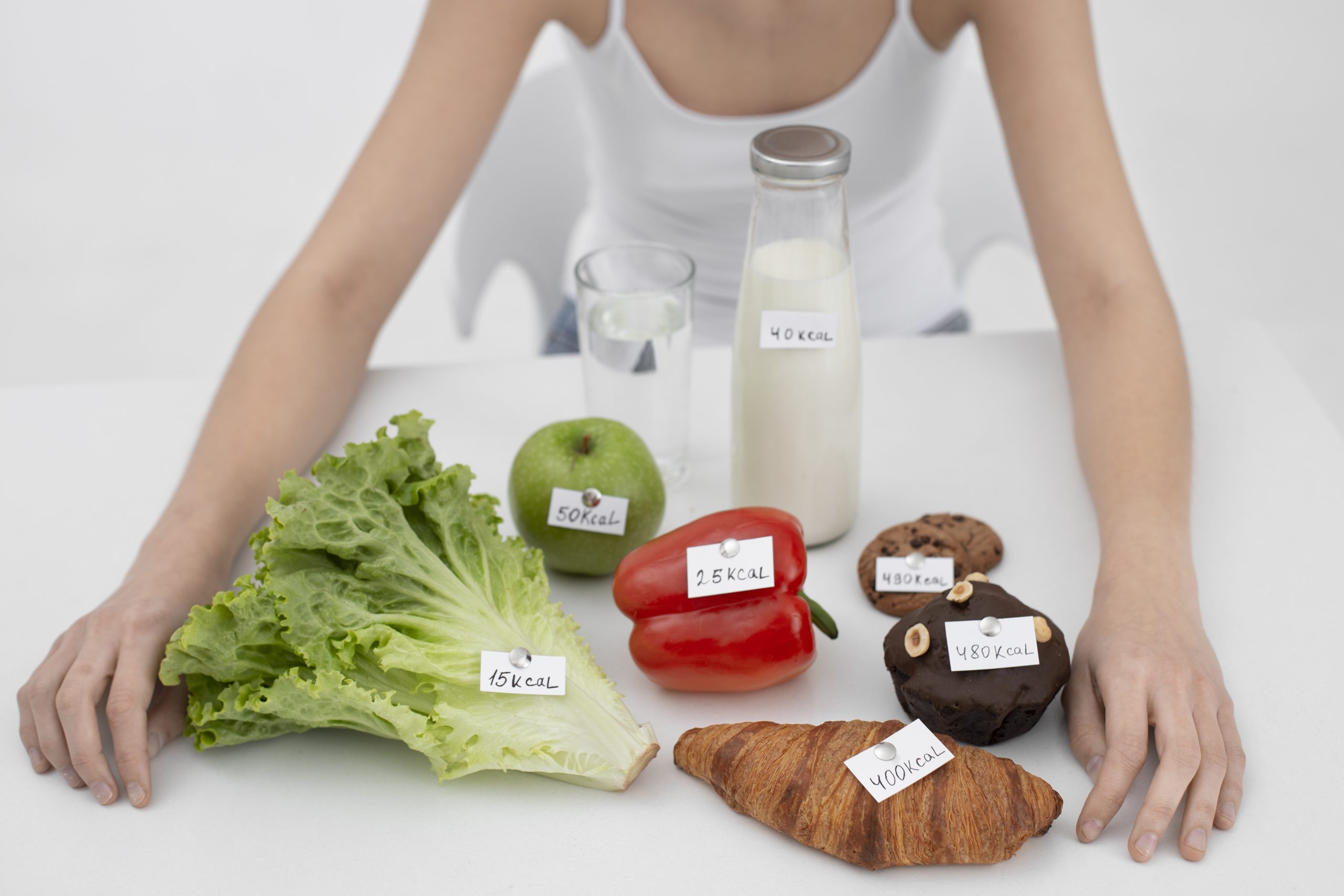 Protein, carb, and fat sources arranged for a fat loss meal plan