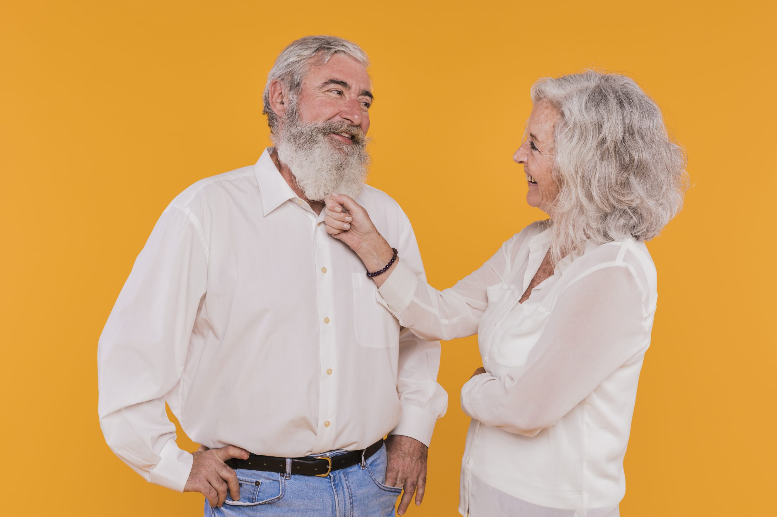 Older couple standing and walking together outdoors