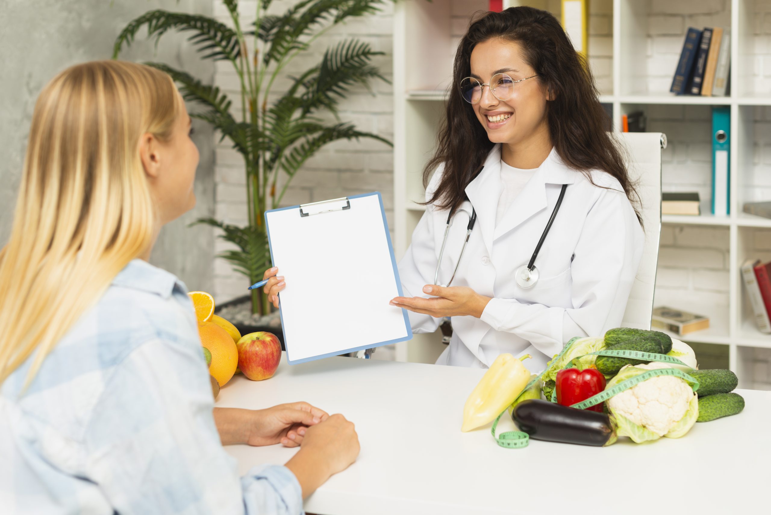 Doctor reviewing BMI results with a patient