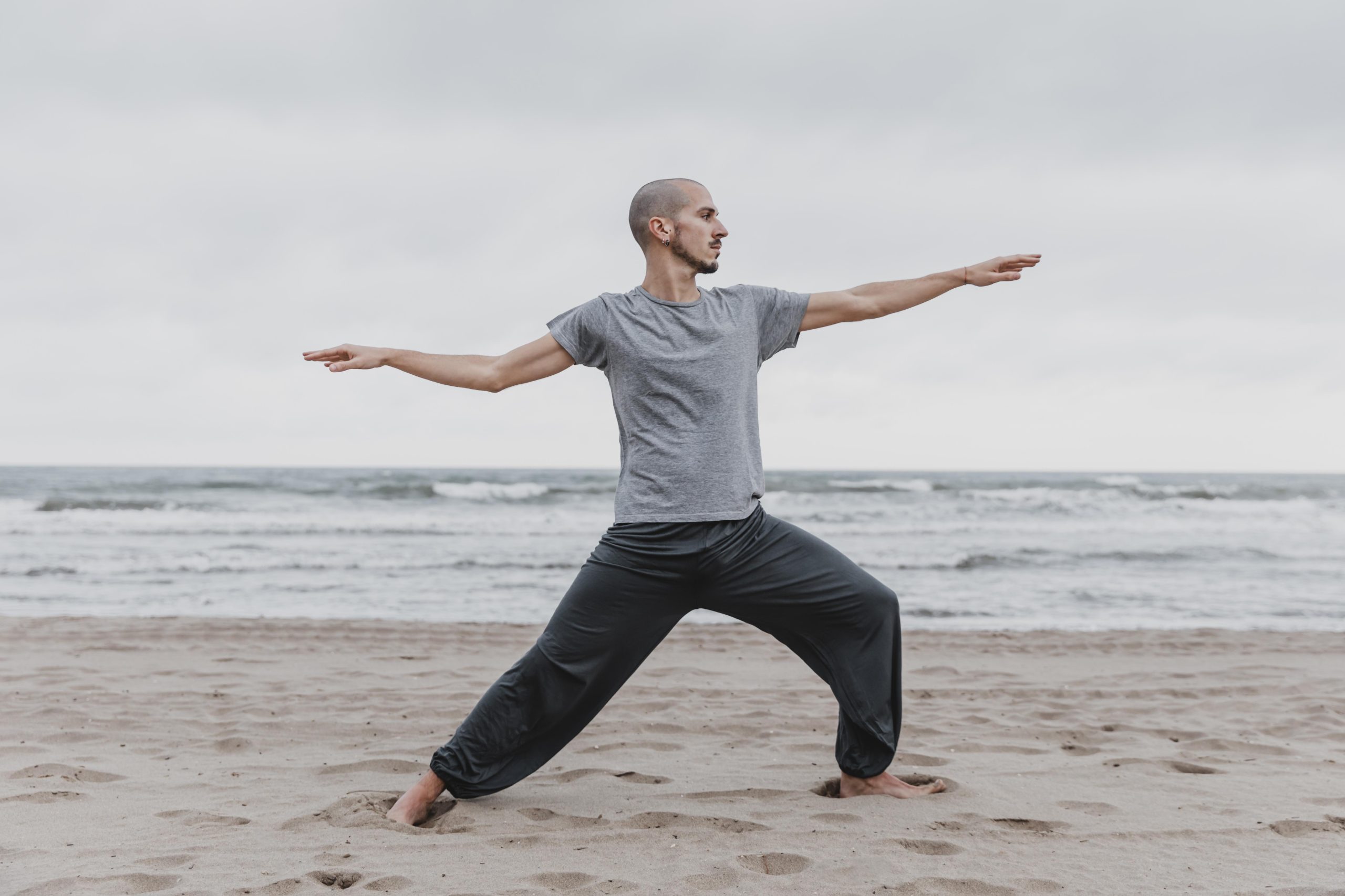 side-view-man-practicing-yoga-positions-outdoors Does Posture Matter in the Aging Process? 4