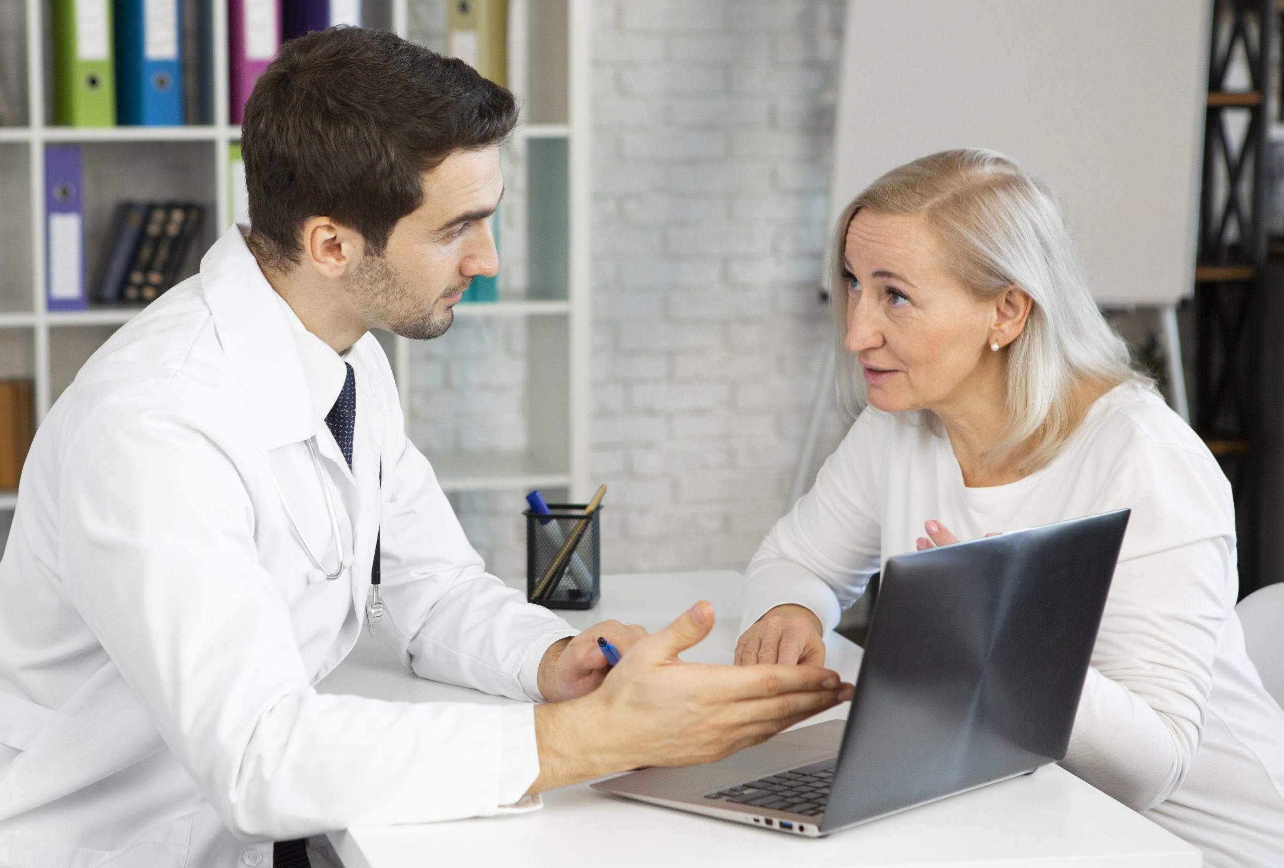 medium-shot-doctor-patient-discussing What Do Anti-Aging Clinics Offer?