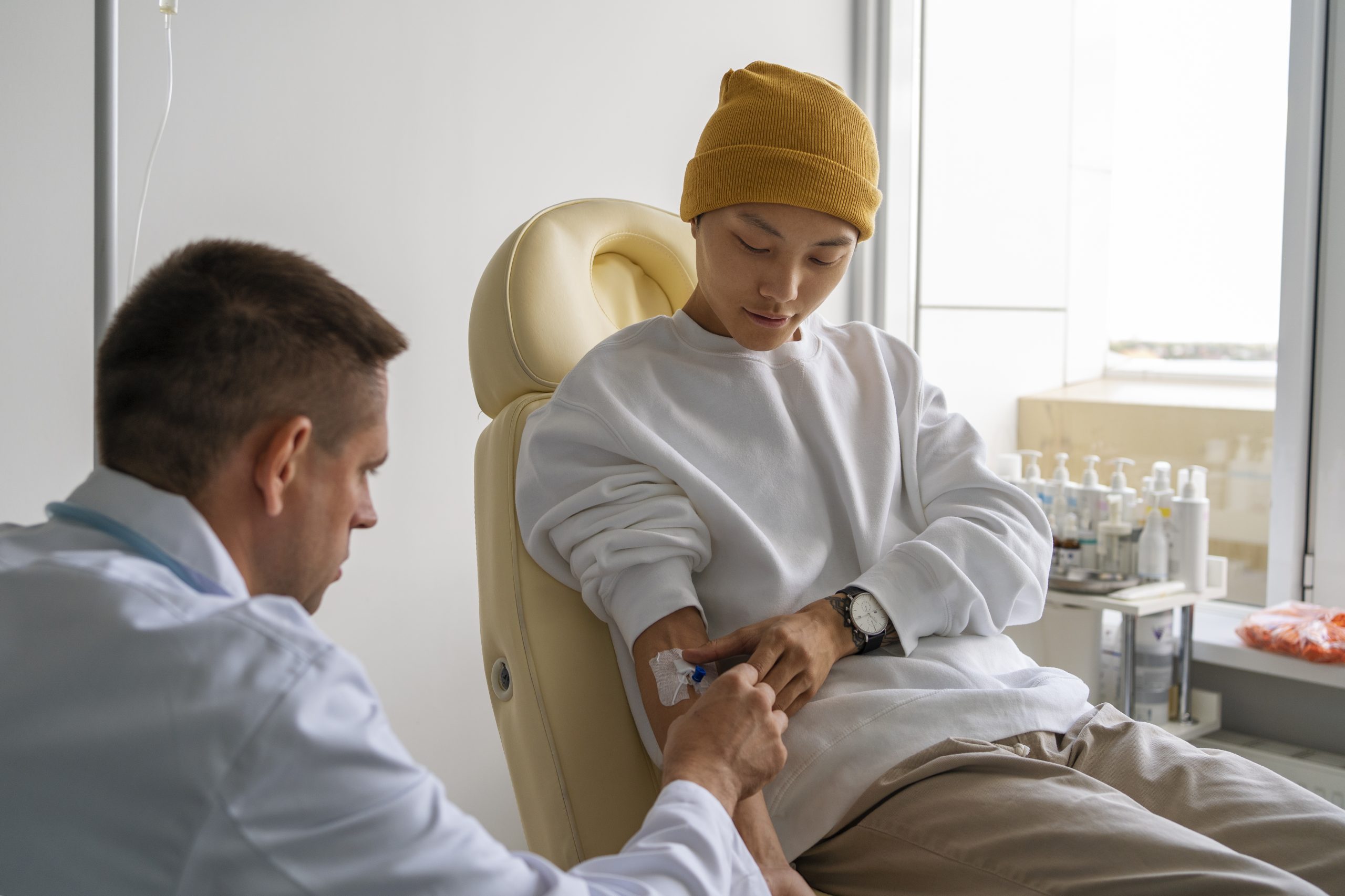 medium-shot-sick-man-sitting-chair Hormone and Wellness Therapies