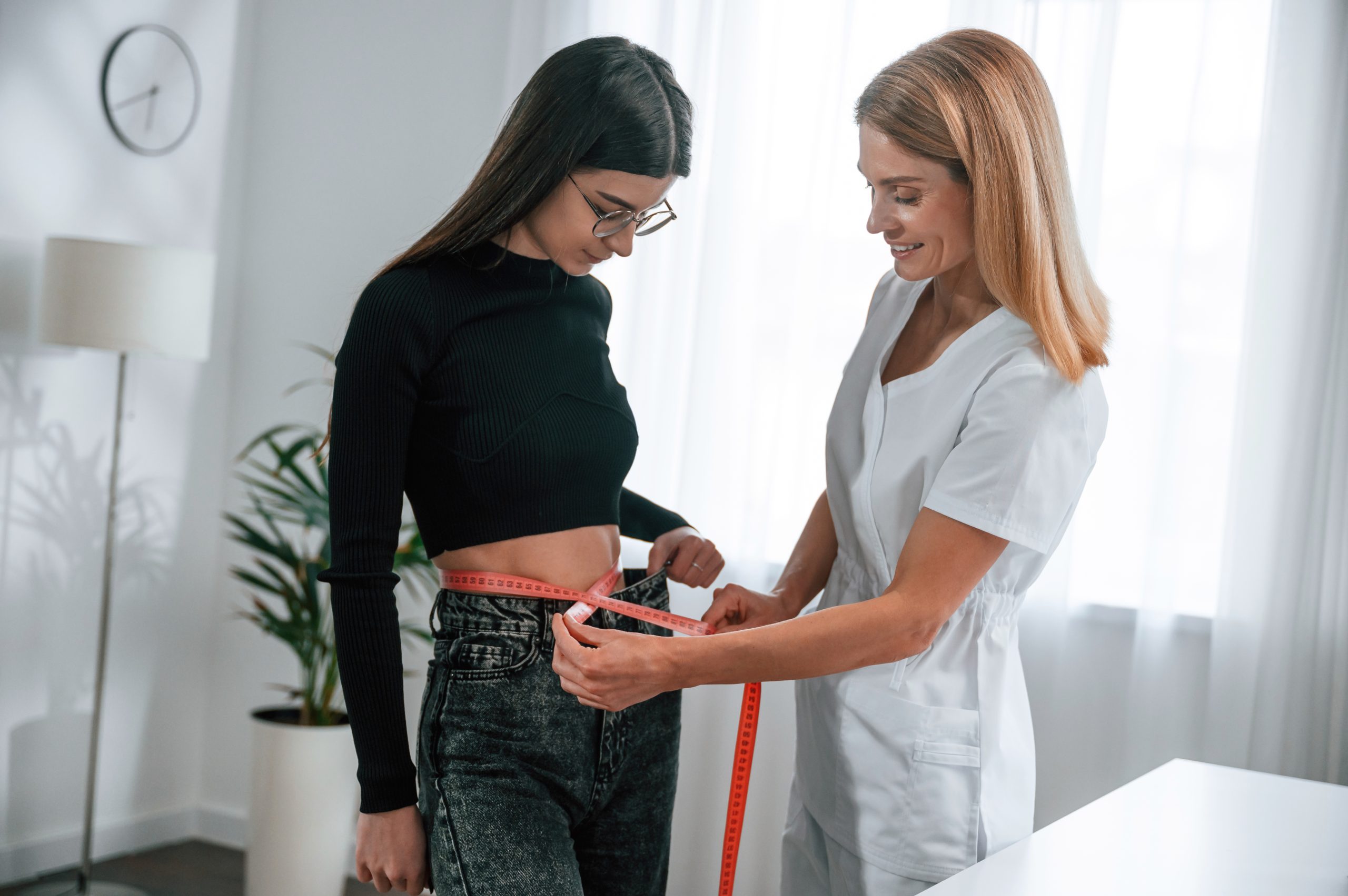 B12 Shot Weight Loss Reviews Doctor administering B12 injection for weight loss at Just Lose Weight MD