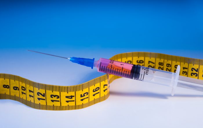 Doctor administering Semaglutide injection for weight loss