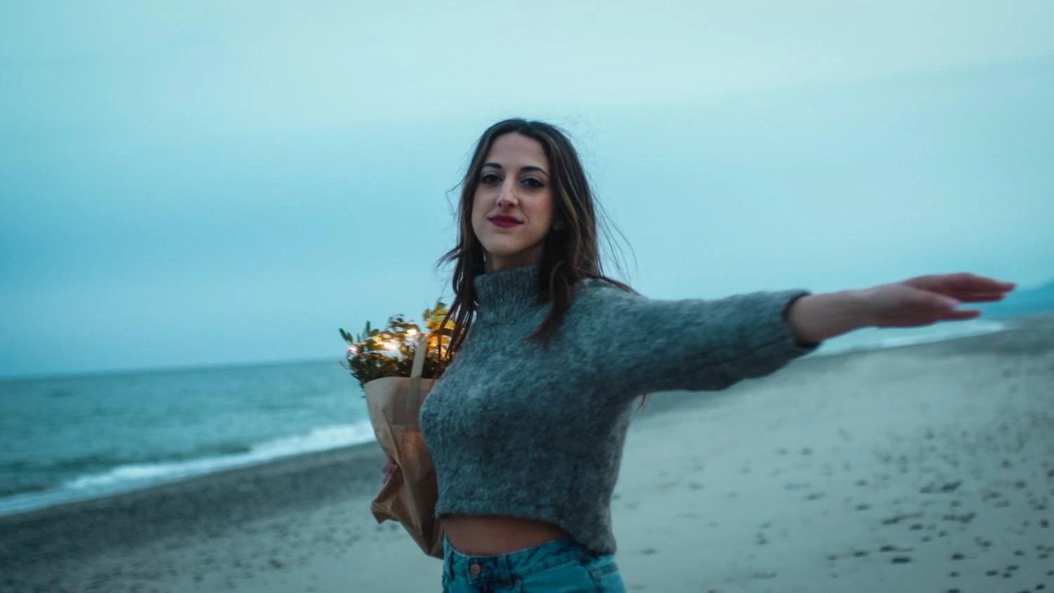 bella-plus-holiday-success Joyful client in holiday attire after Bella Plus weight loss success